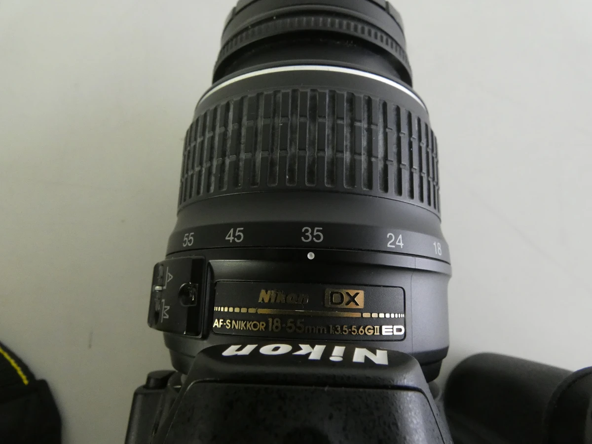 Nikon D3100 spiegelreflexcamera met accessoires en tas - foto 8