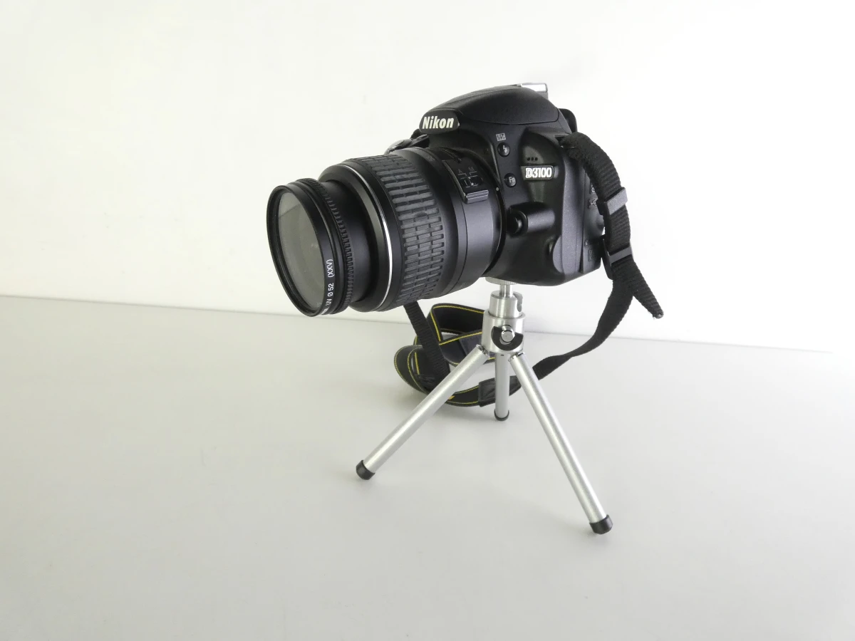 Nikon D3100 spiegelreflexcamera met accessoires en tas - foto 9