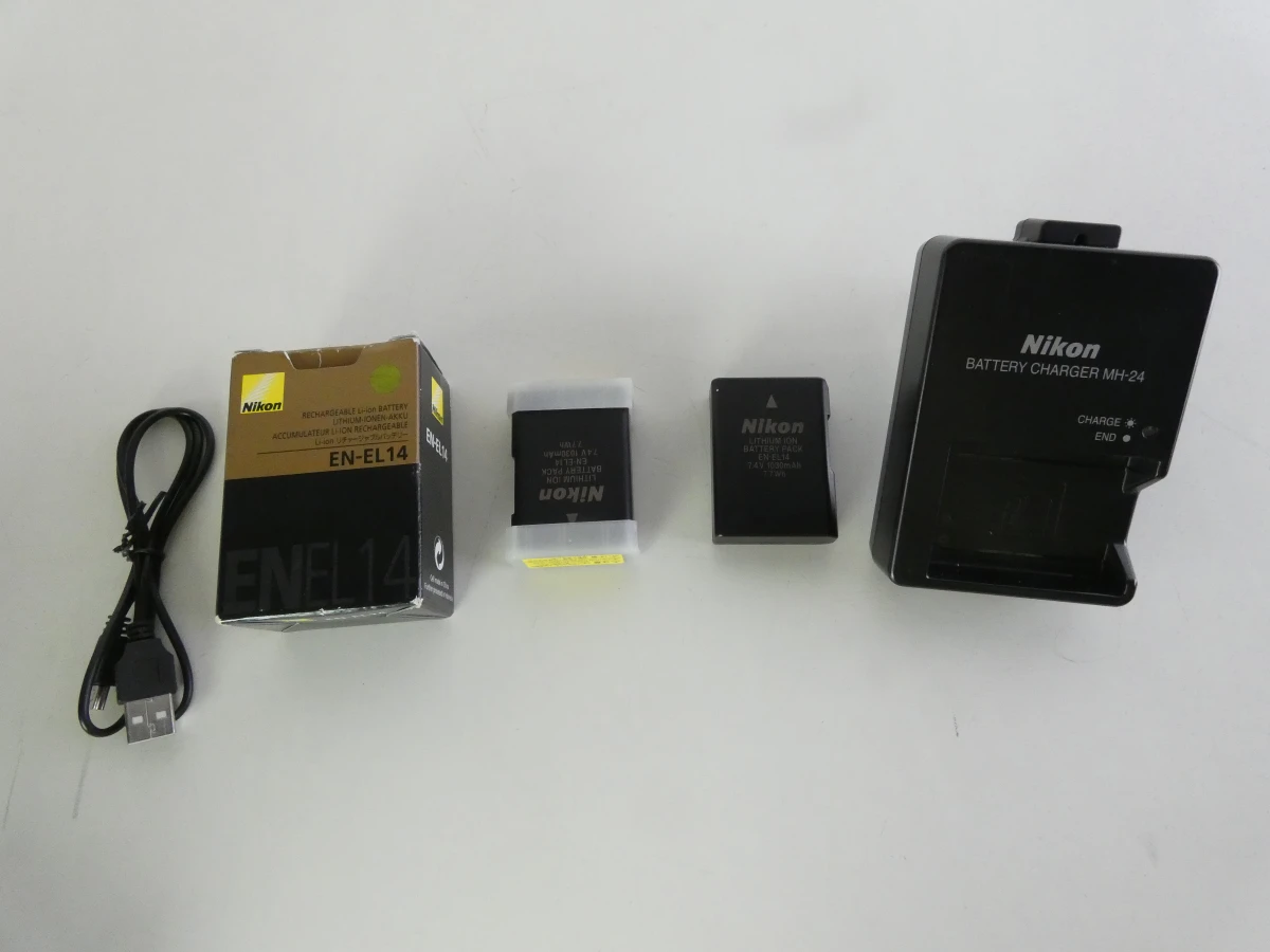Nikon D3100 spiegelreflexcamera met accessoires en tas - foto 12