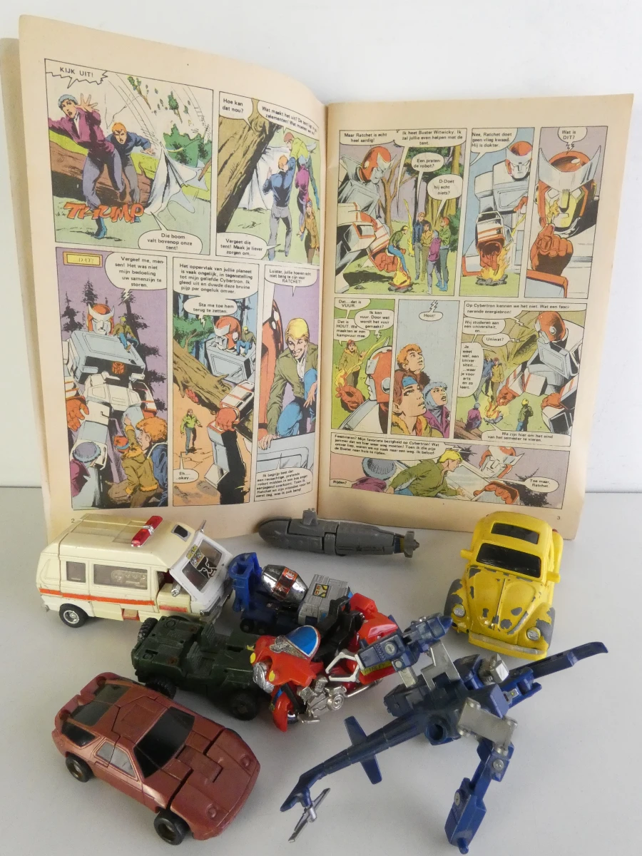 Transformers strip nr. 4 met 8 vintage voertuigen - foto 2