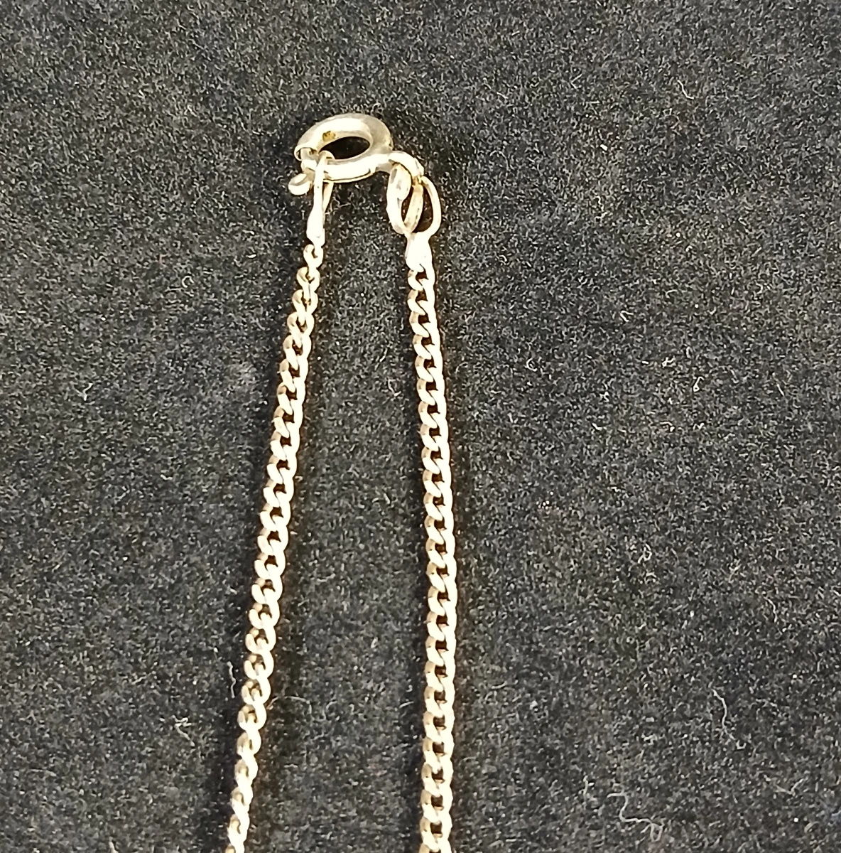 Zilveren ketting met abstracte hanger en zirkonia's - foto 3