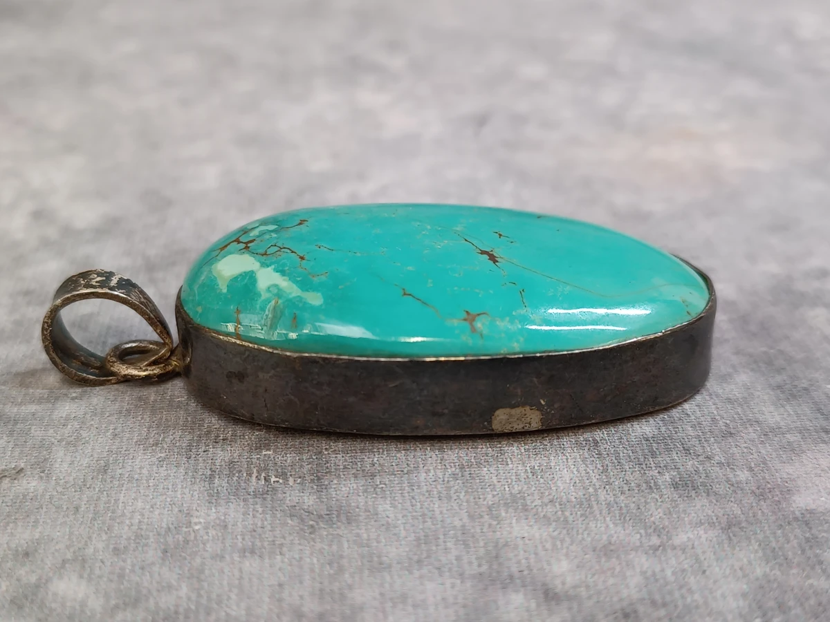 Zilveren hanger en armband met turquoise stenen - foto 4