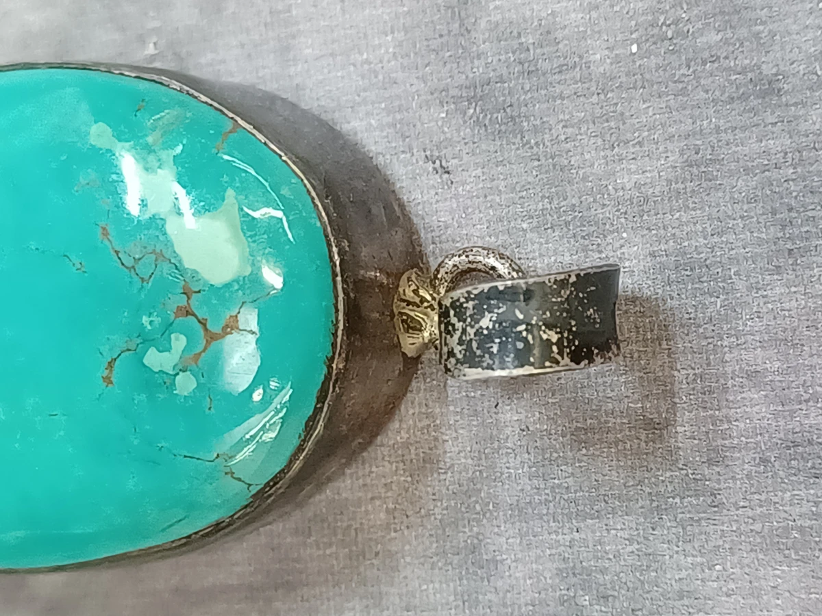 Zilveren hanger en armband met turquoise stenen - foto 6