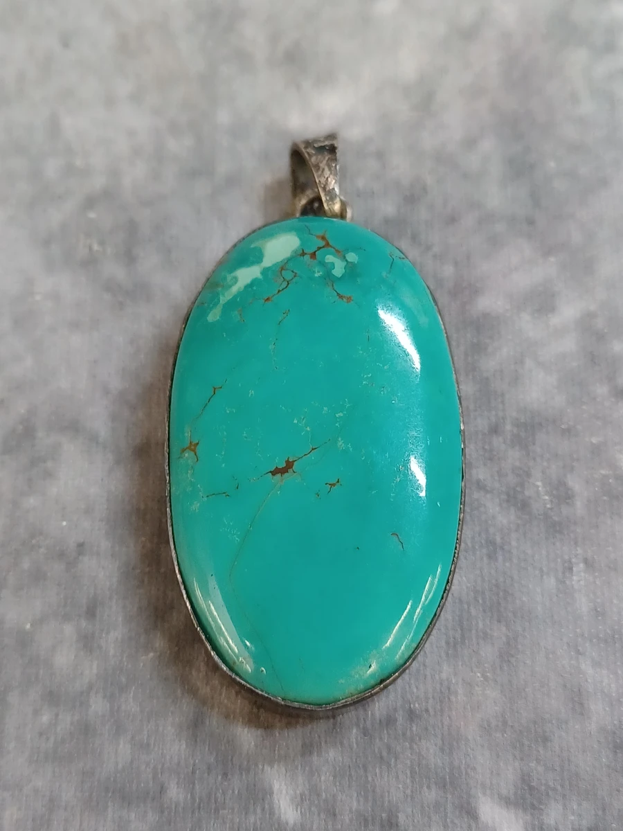 Zilveren hanger en armband met turquoise stenen - foto 3