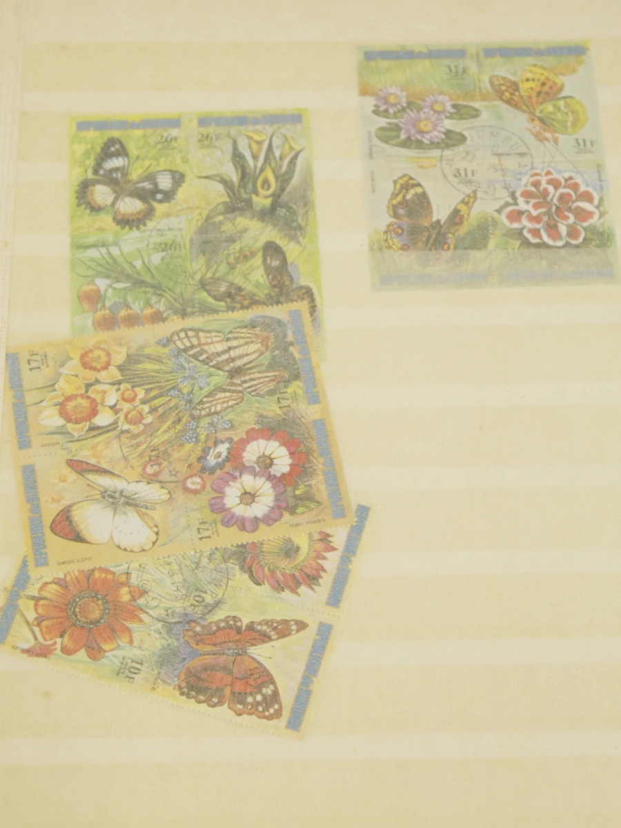 Lot van Nationale & internationale postzegels, postzegelalbums en Filatelistische boeken - foto 12