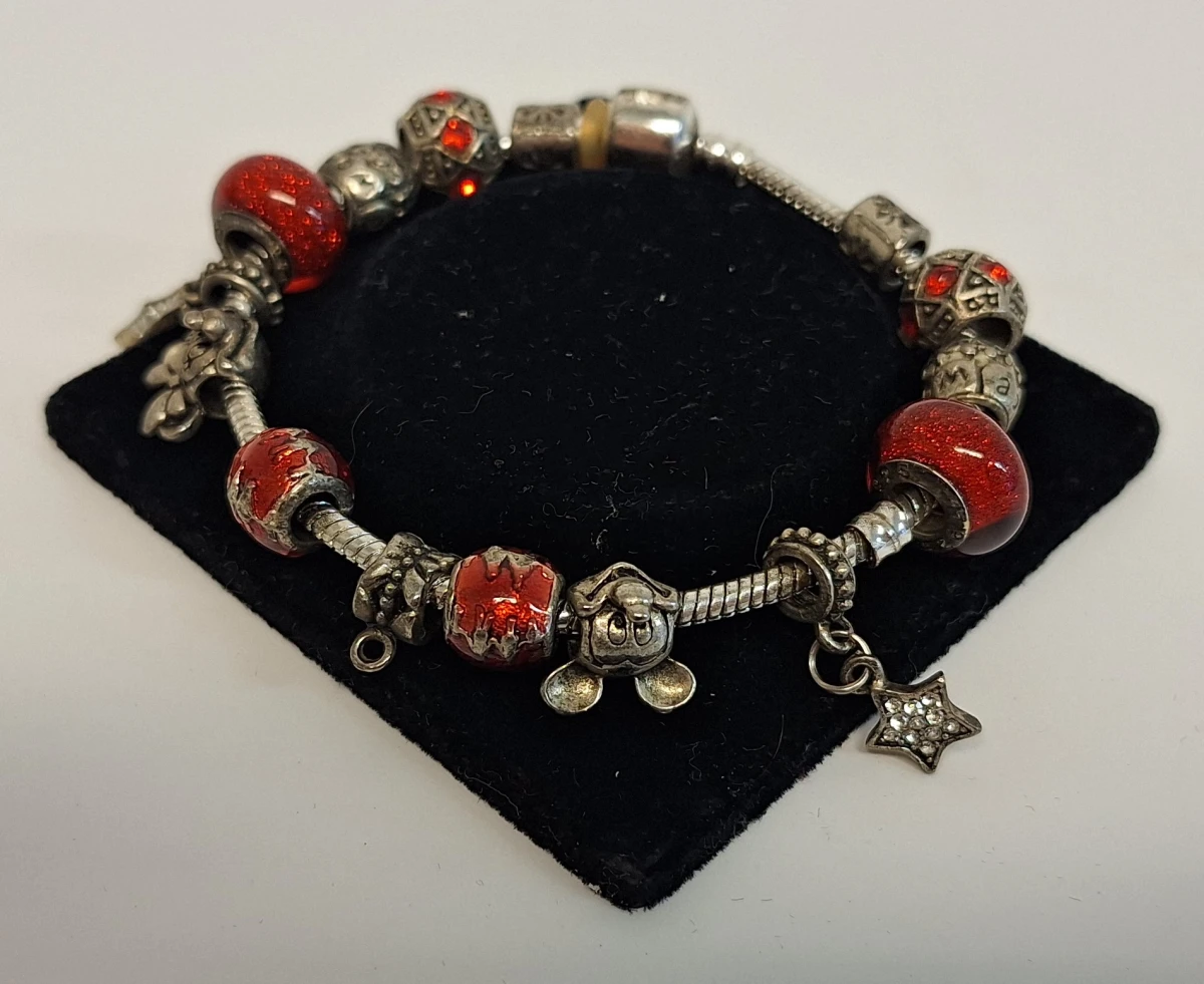 Bedelarmband met zilveren bedels - foto 3