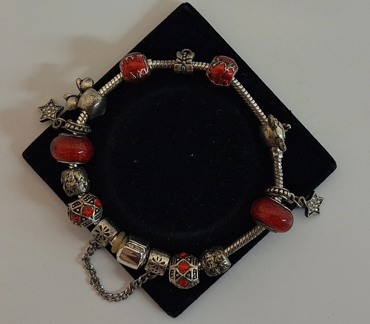 Bedelarmband met zilveren bedels - foto 4