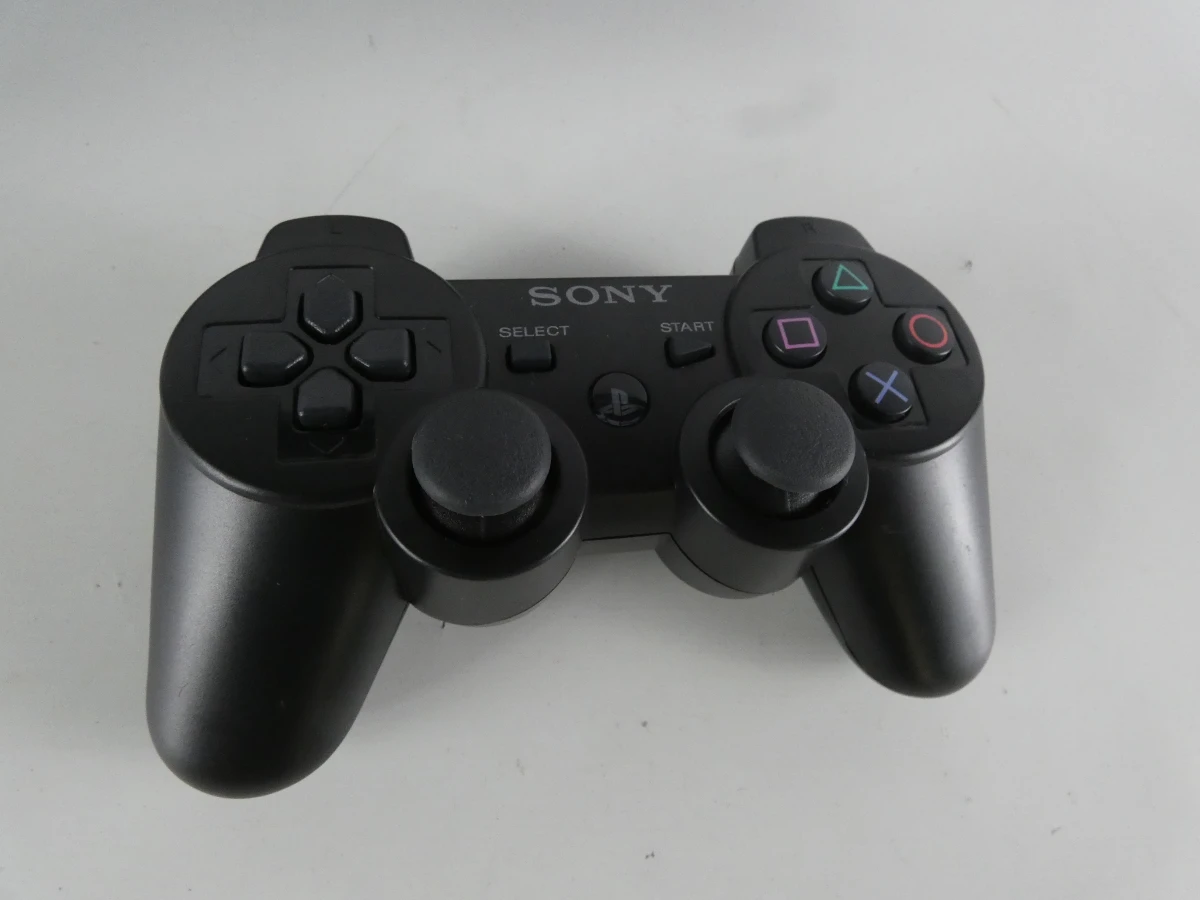 Playstation 3 met controller en spelletjes - foto 2
