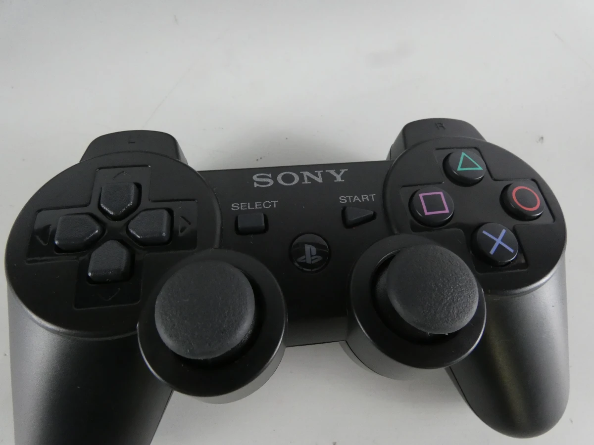 Playstation 3 met controller en spelletjes - foto 3