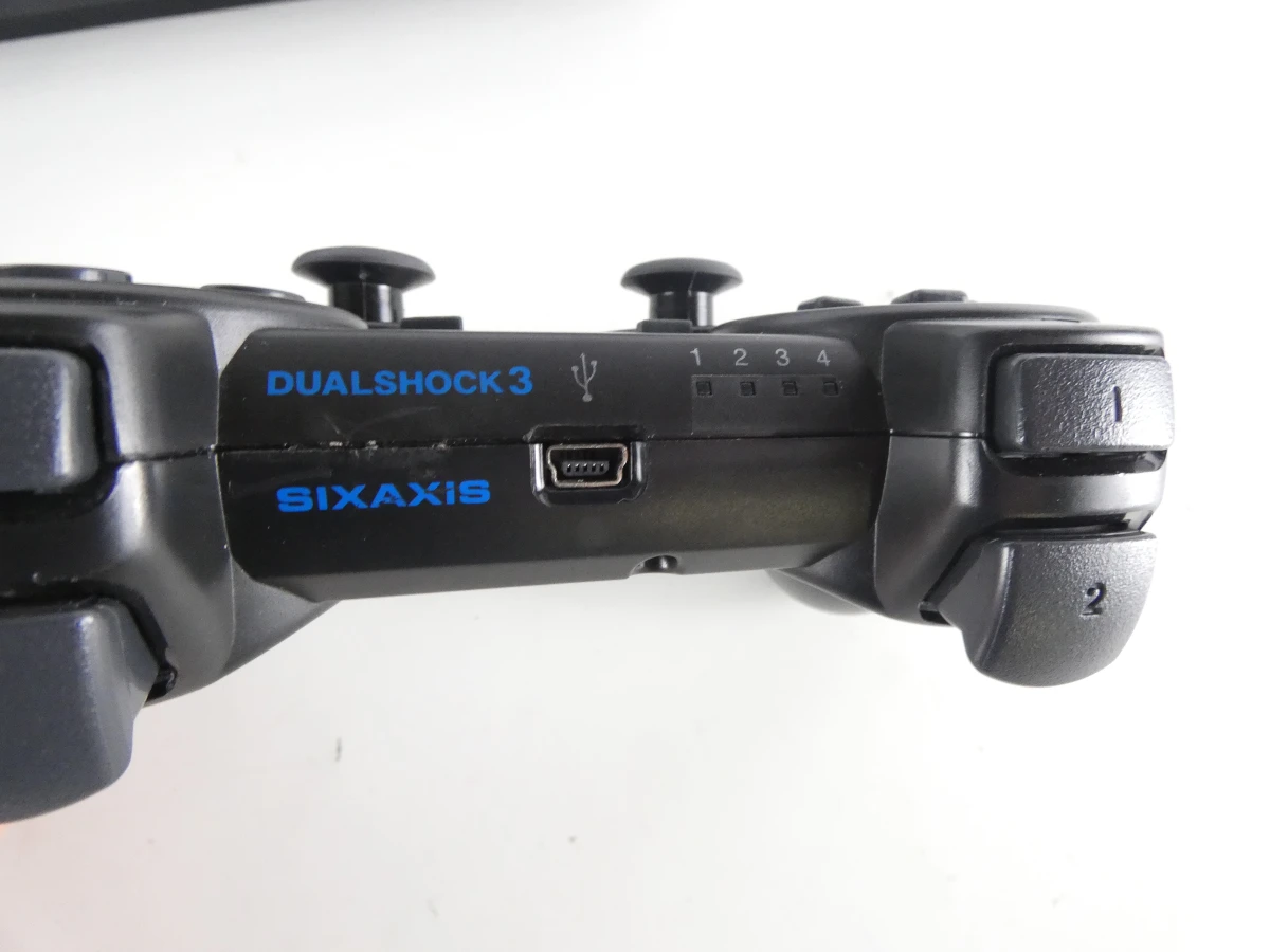 Playstation 3 met controller en spelletjes - foto 4