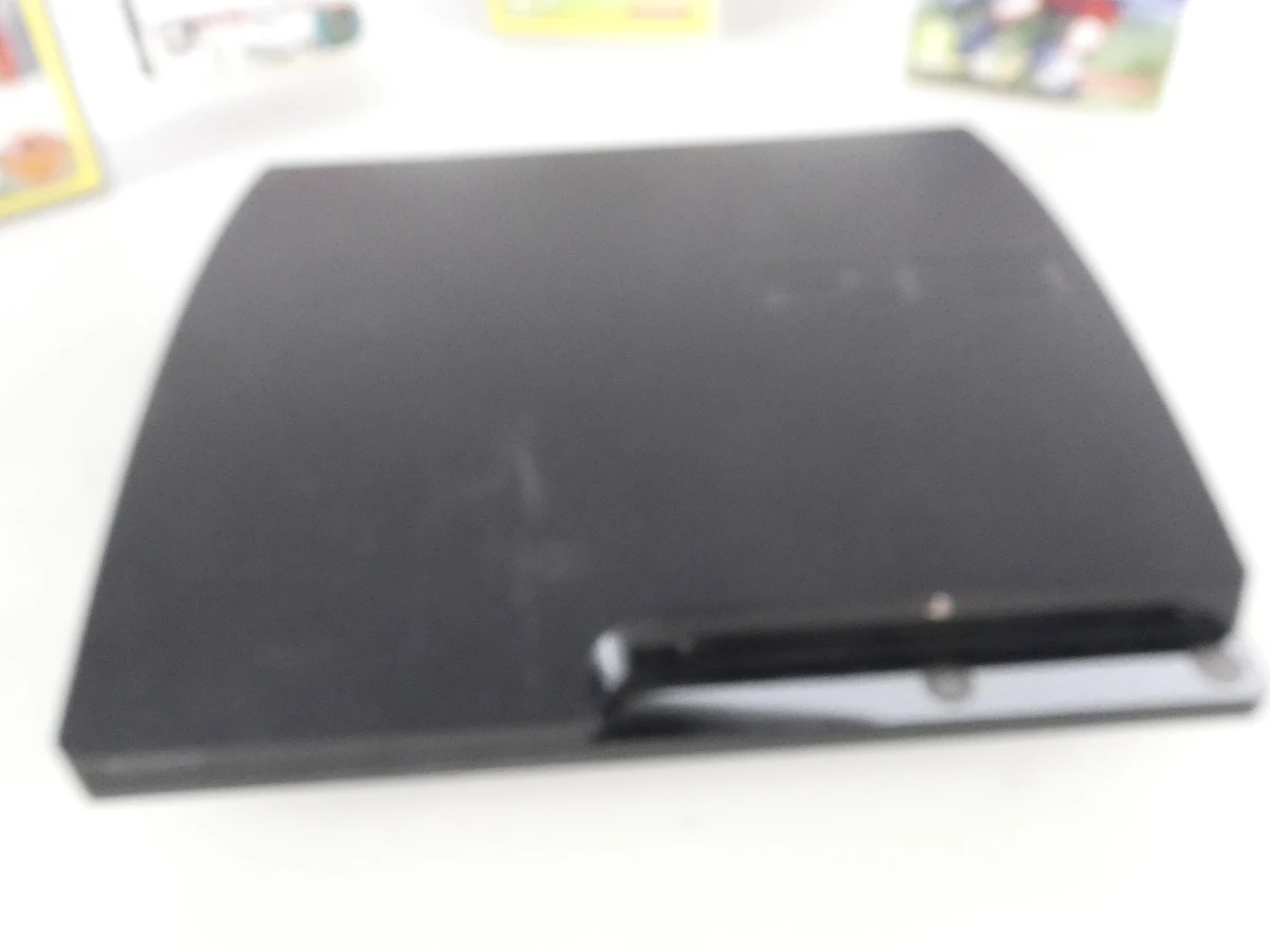 Playstation 3 met controller en spelletjes - foto 7