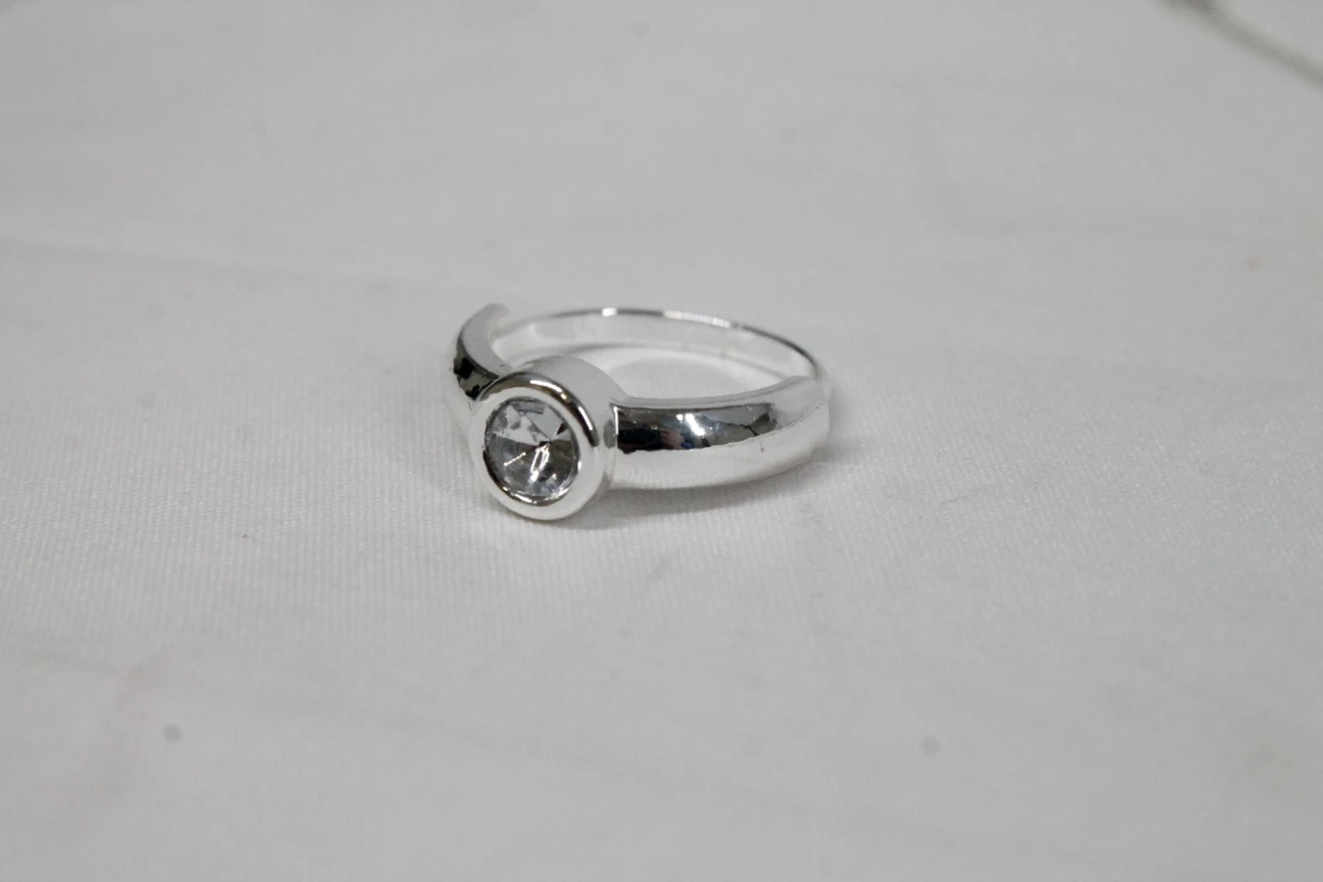 Zilverkleurige juwelenset (Ring en halsketting) - foto 6