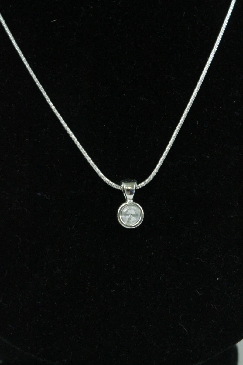 Zilverkleurige juwelenset (Ring en halsketting) - foto 3