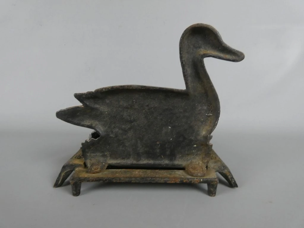 Vintage metalen schoenveger met eend decoratie - foto 3