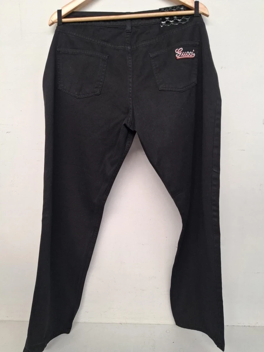 Zwarte denim jeans van het luxe modehuis Gucci - foto 2