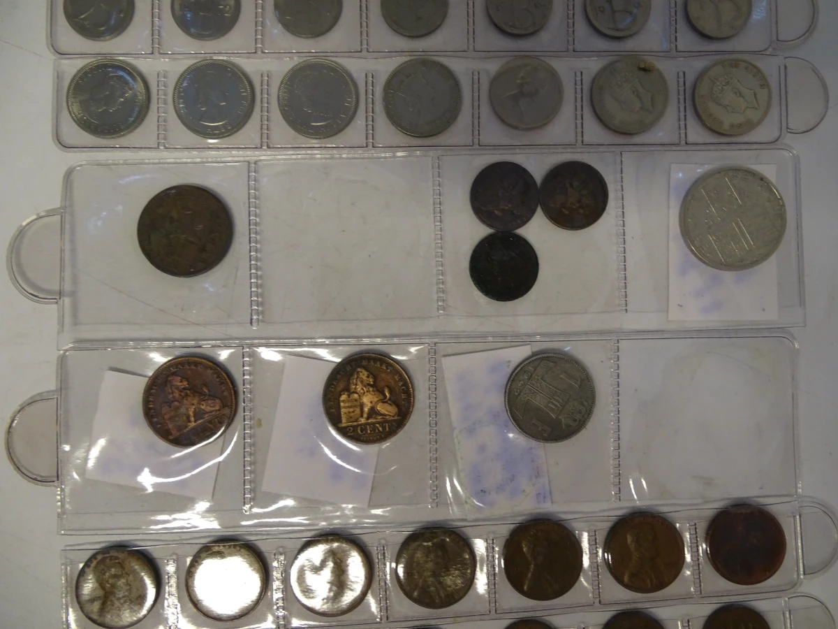 Verzameling oude munten en bankbiljetten in album - foto 62
