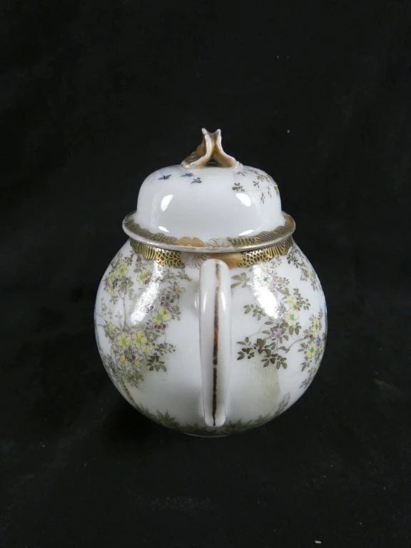 Porseleinen theeservies met decoratieve vogels en bloemen - foto 11