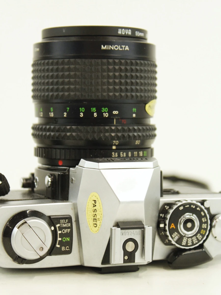 Minolta XG-9 35mm SLR met MD Zoom Rokkor 35-70mm f/3.5 & Hoya UV-filter - foto 6