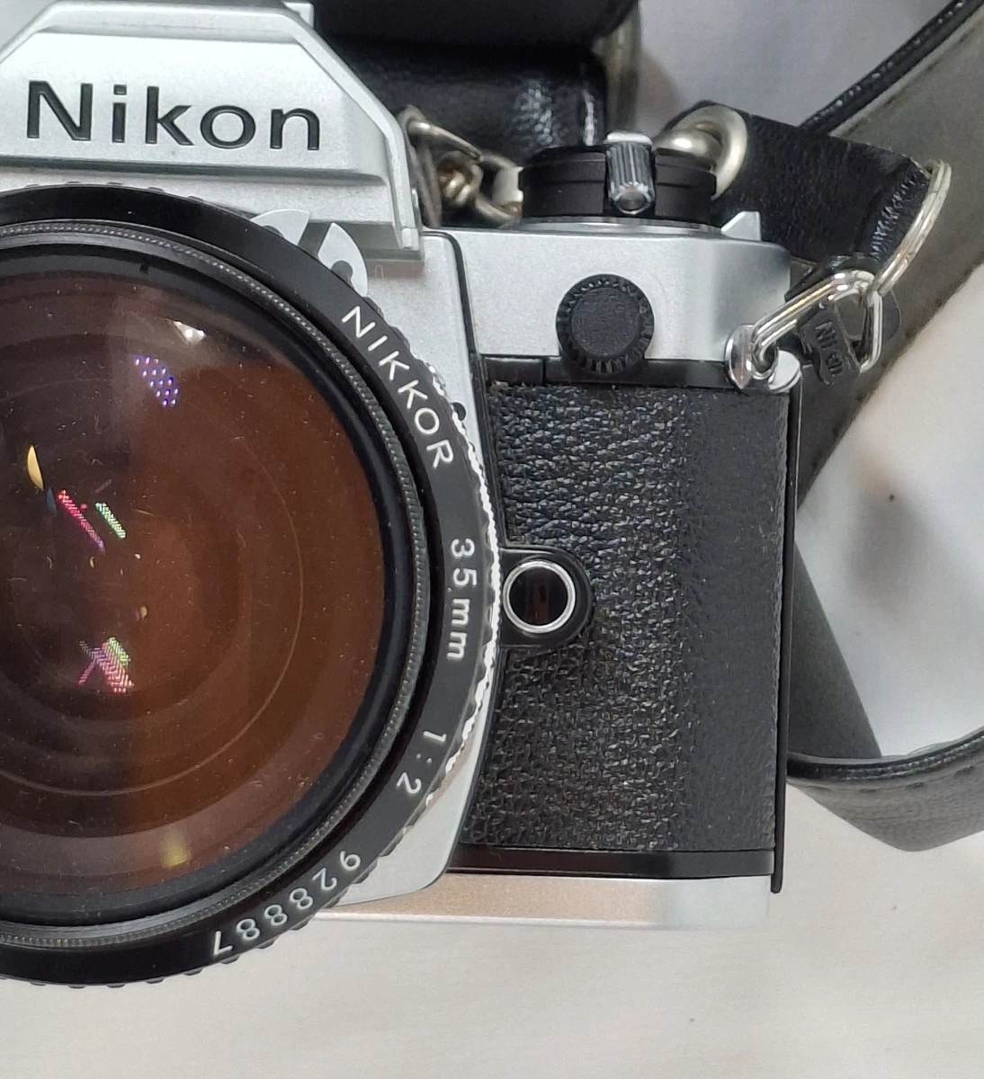 Nikon FM analoge spiegelreflexcamera met lens en draagriem - foto 6