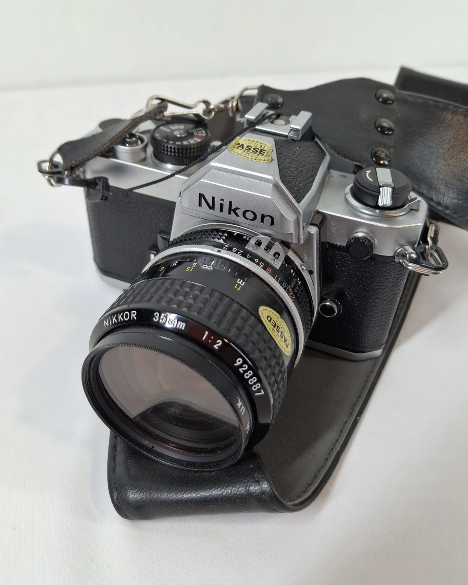 Nikon FM analoge spiegelreflexcamera met lens en draagriem - foto 7