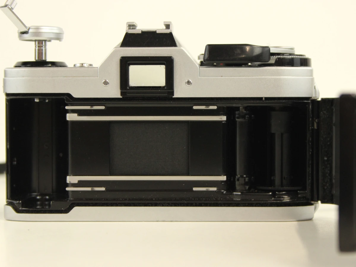 Canon AE-1 spiegelreflexcamera met lenzen en toebehoren - foto 7
