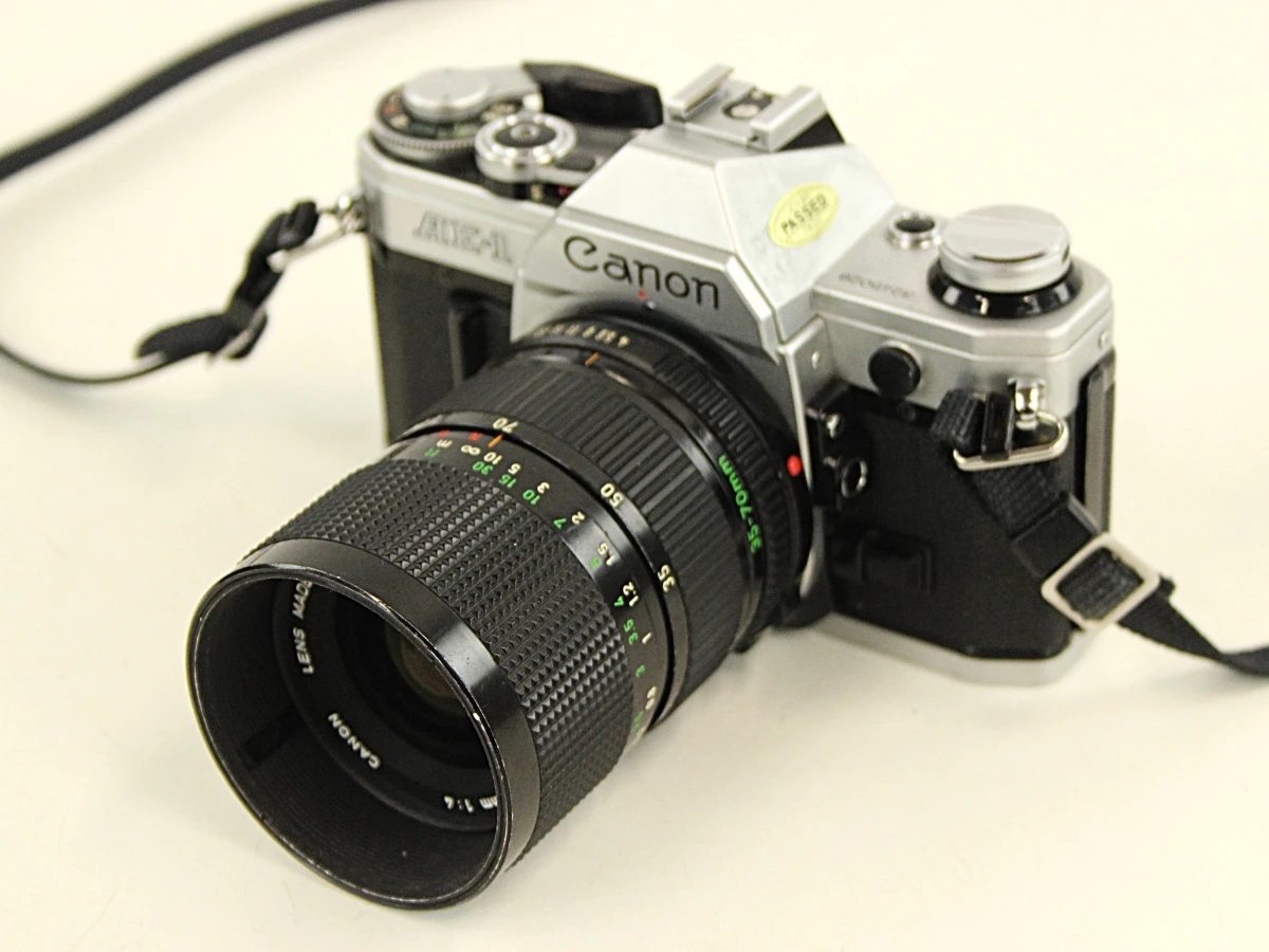 Canon AE-1 spiegelreflexcamera met lenzen en toebehoren - foto 15