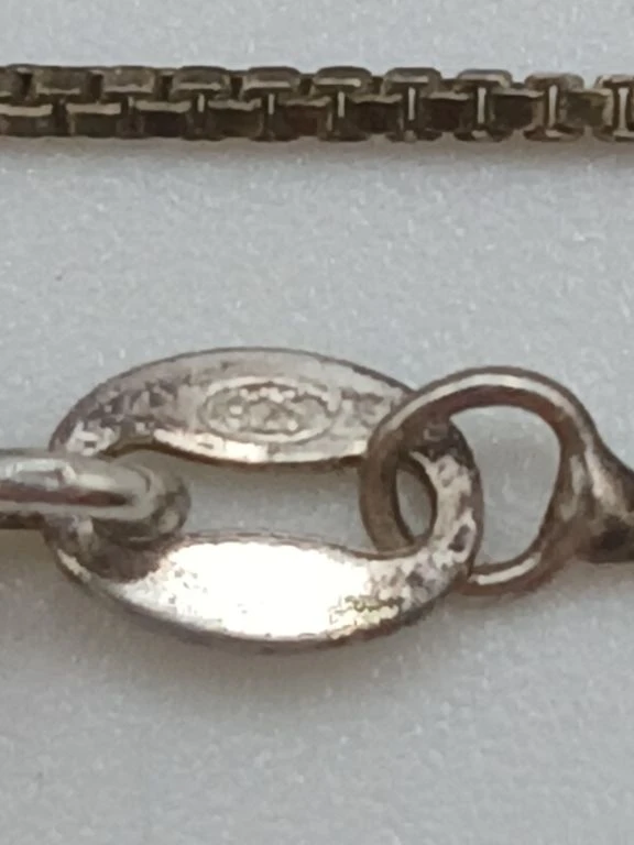 Zilveren ketting met drie verbonden ringen - foto 2