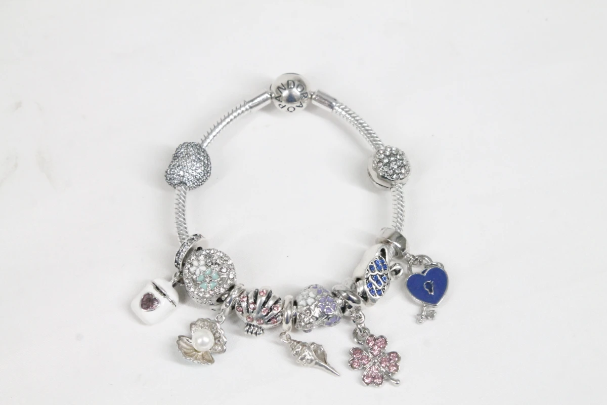 Pandora armband met diverse bedels - foto 7