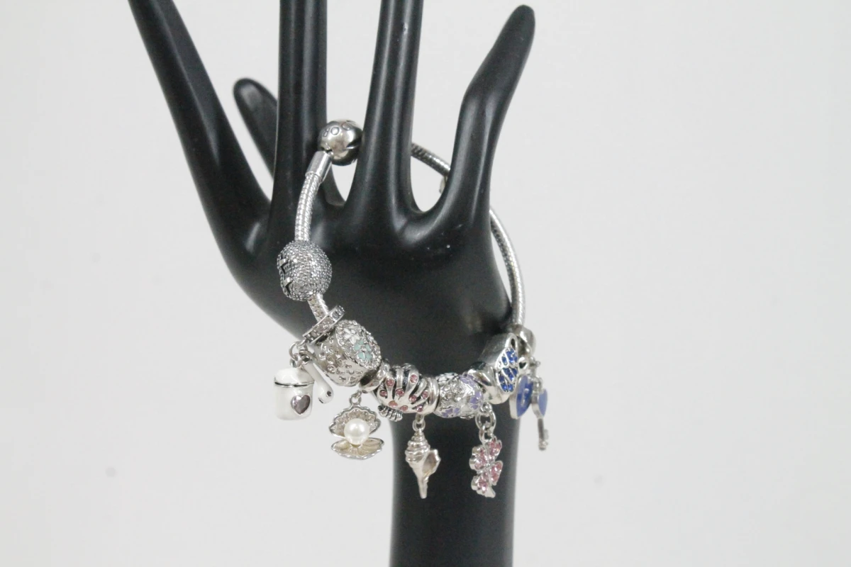Pandora armband met diverse bedels - foto 2
