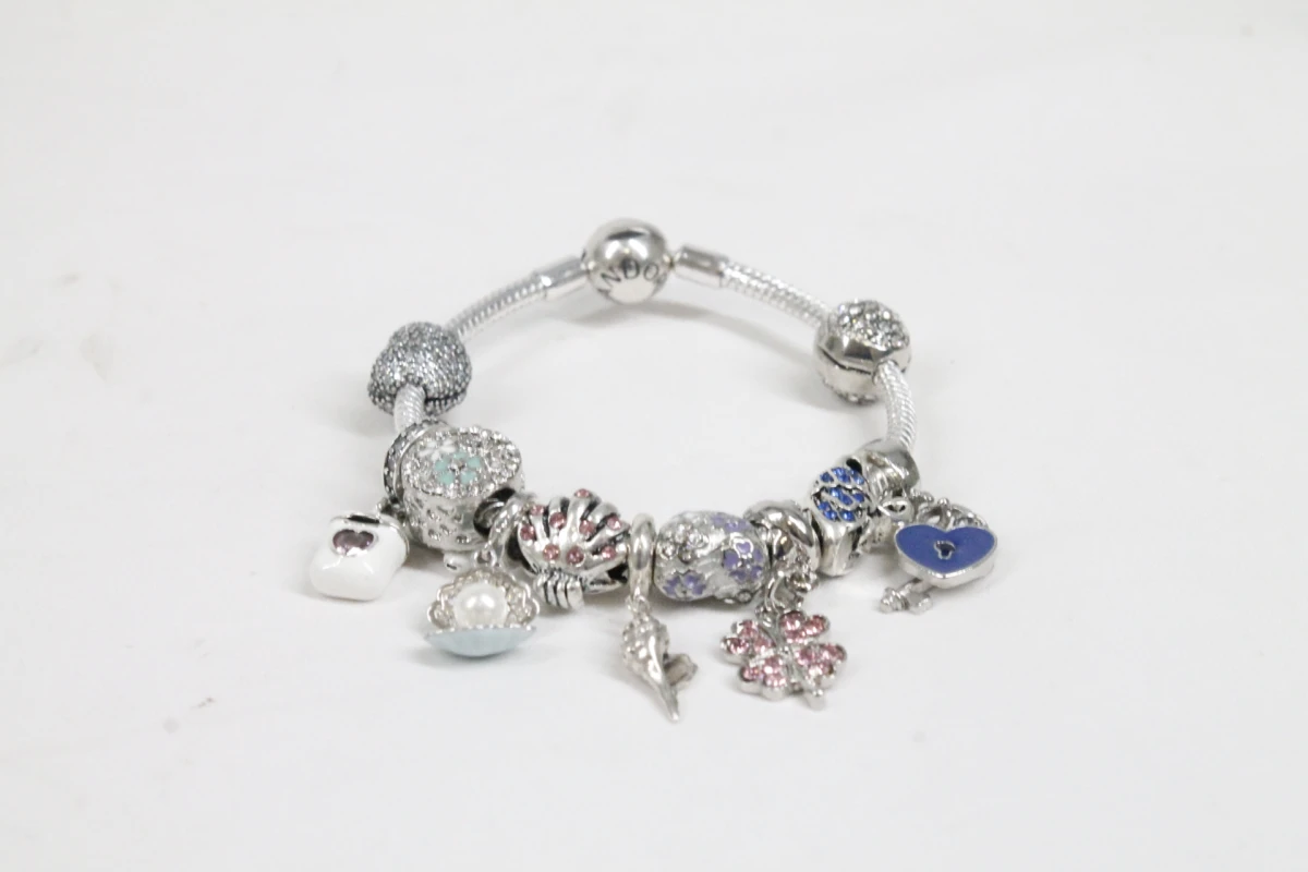 Pandora armband met diverse bedels - foto 5