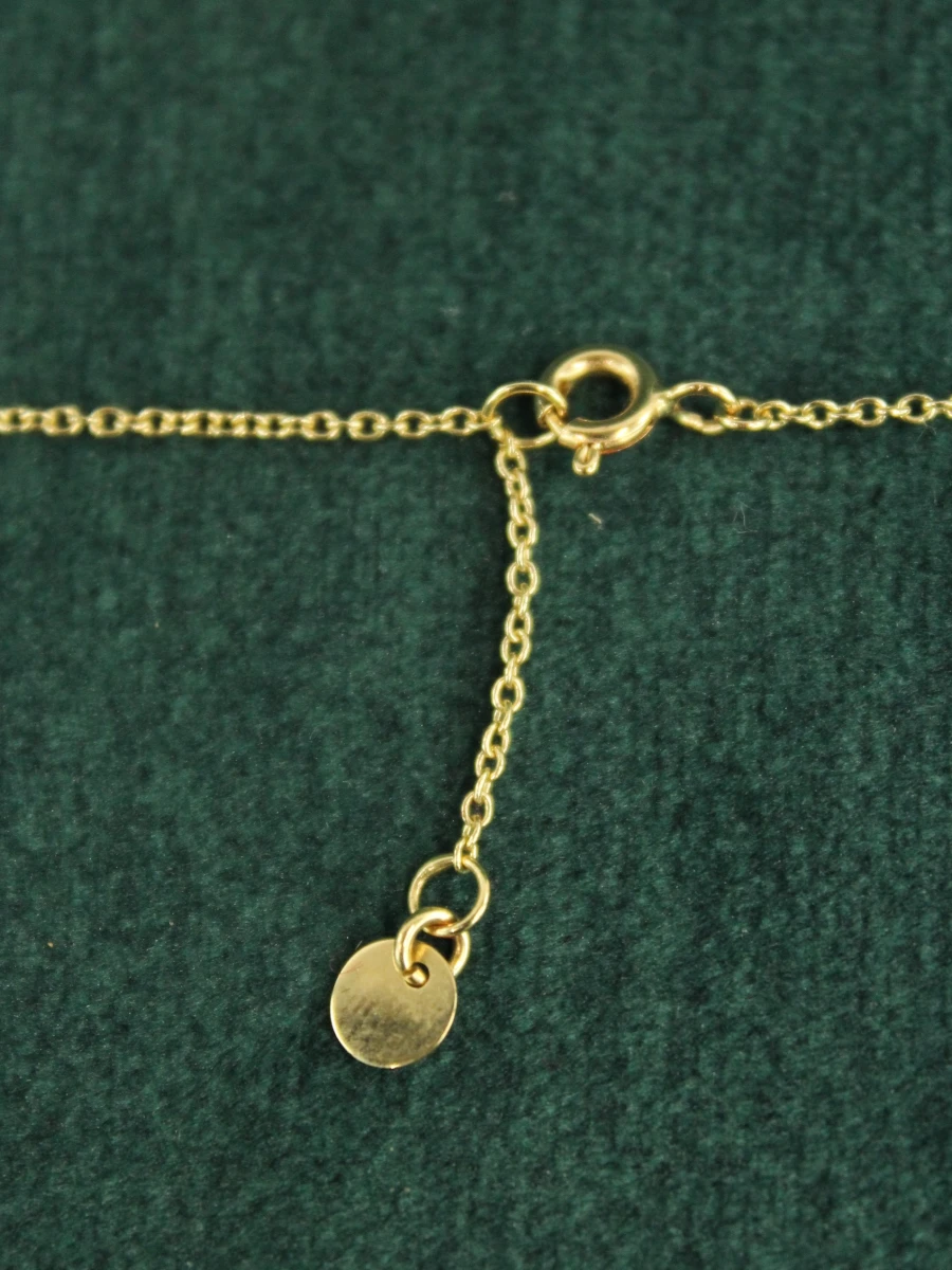 14-karaats gouden halsketting met bloemvormige hanger - foto 6