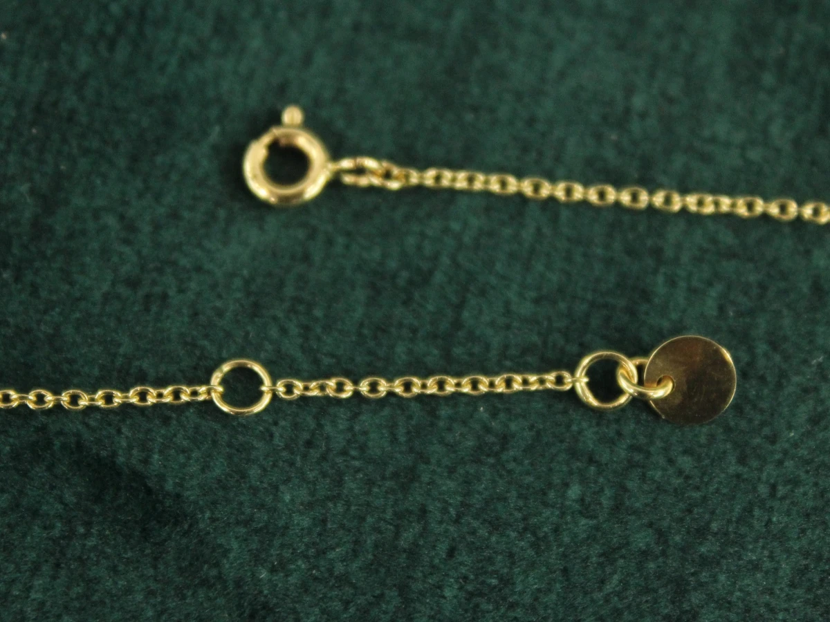 14-karaats gouden halsketting met bloemvormige hanger - foto 8