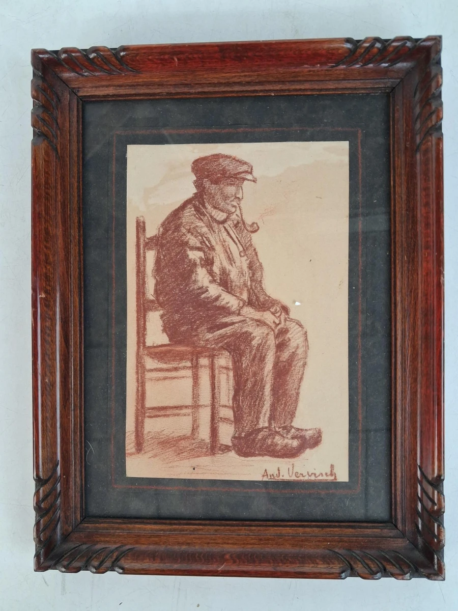 Rood krijttekening van een zittende man