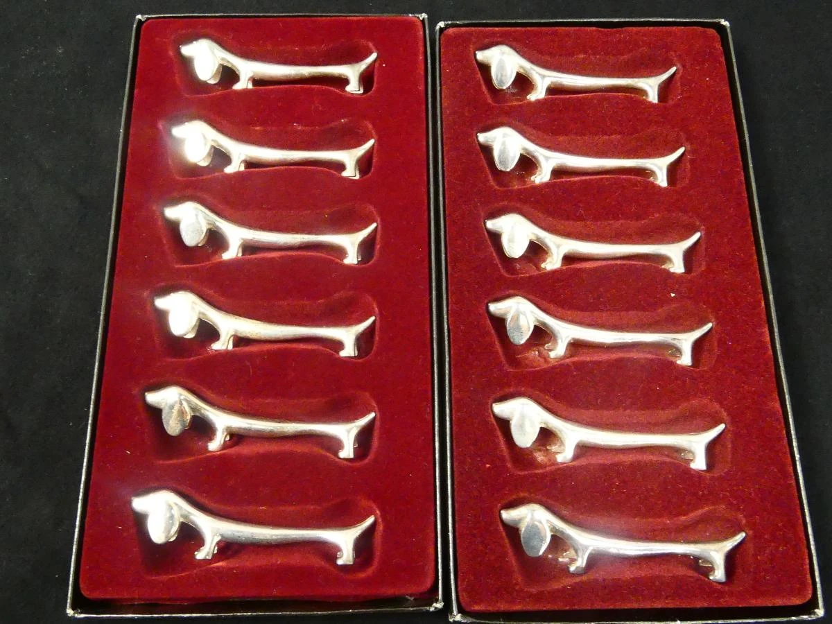 Set vintage 12 zilverkleurige hondenbestekhouders