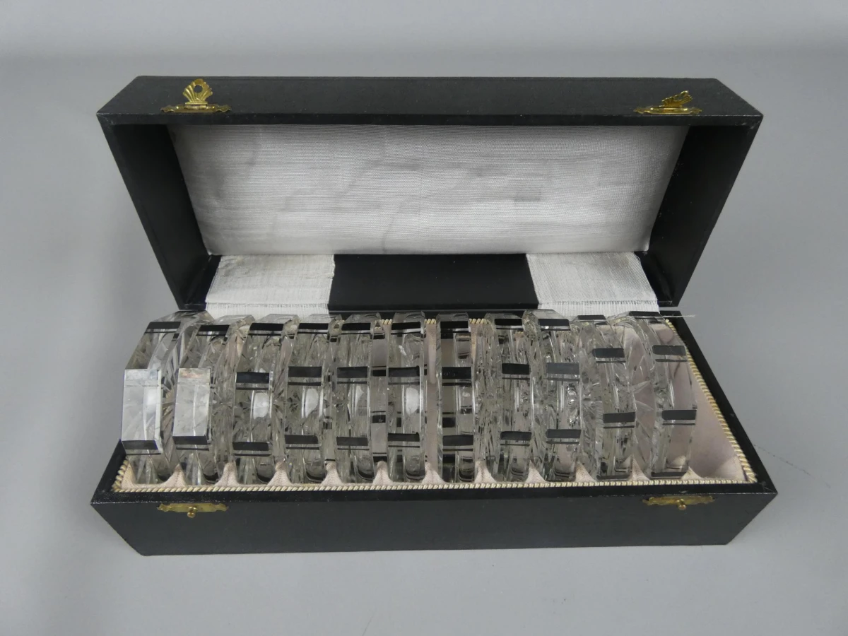 Set van 11 vintage glazen onderzetters in opbergdoos
