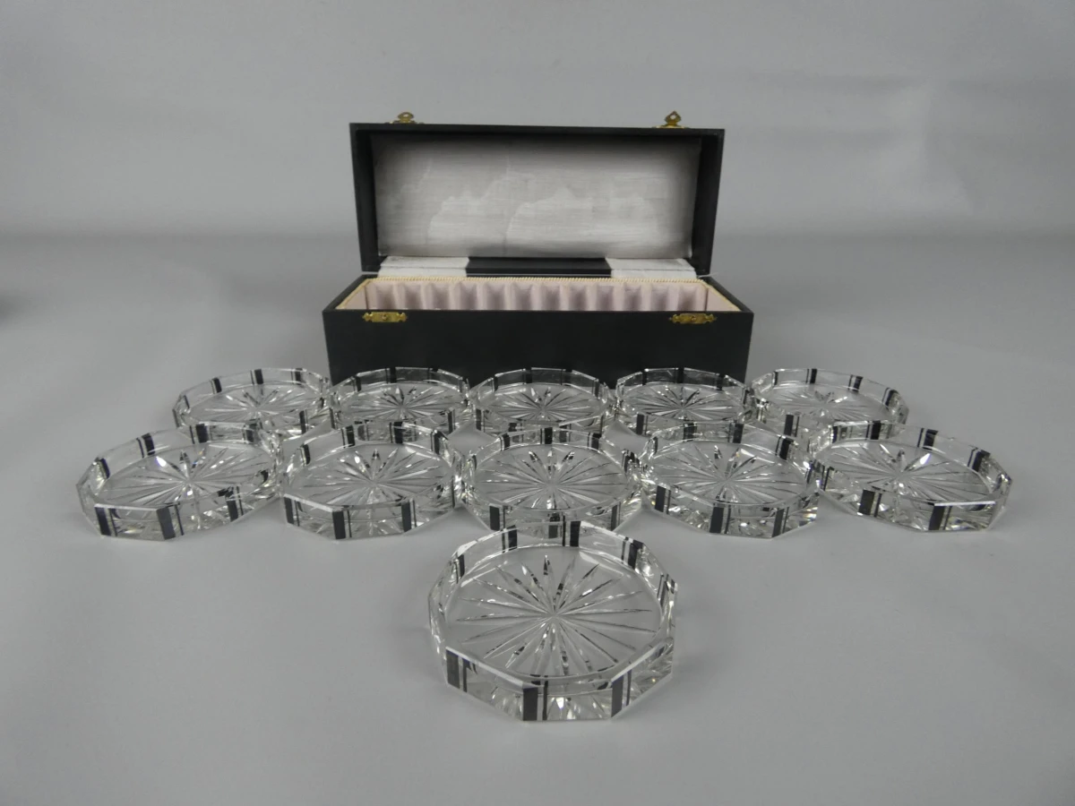 Set van 11 vintage glazen onderzetters in opbergdoos