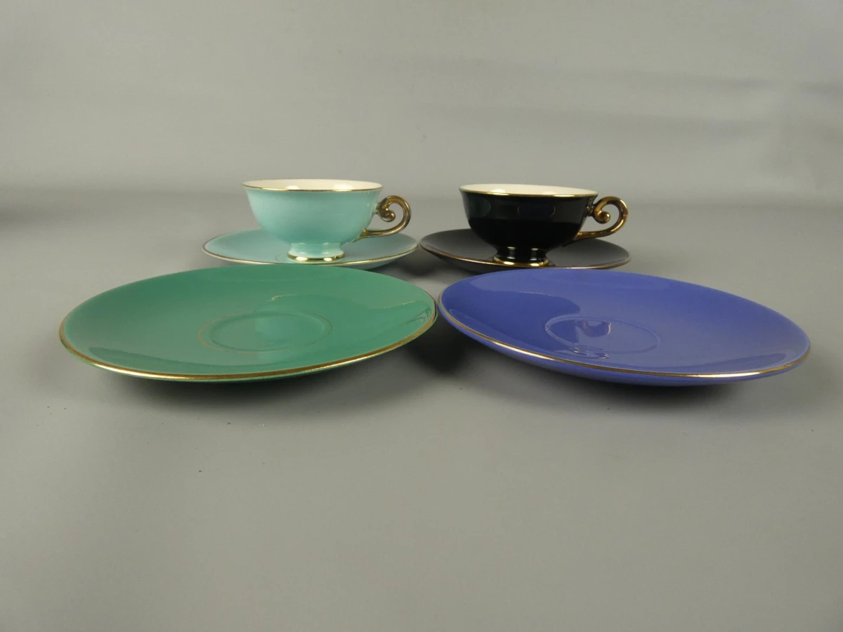 Vintage 2 porseleinen kopjes en 4 schotels - Flora Gouda