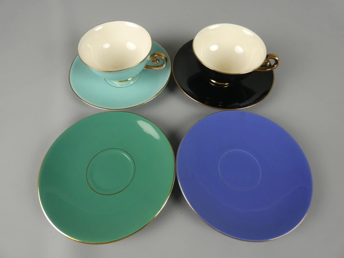 Vintage 2 porseleinen kopjes en 4 schotels - Flora Gouda