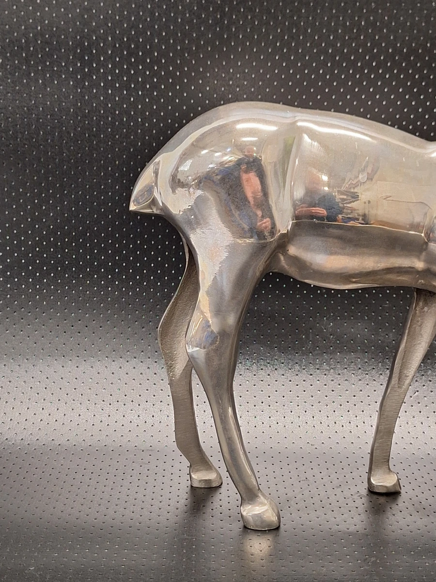 Set van drie zilverkleurige aluminium hertenbeelden