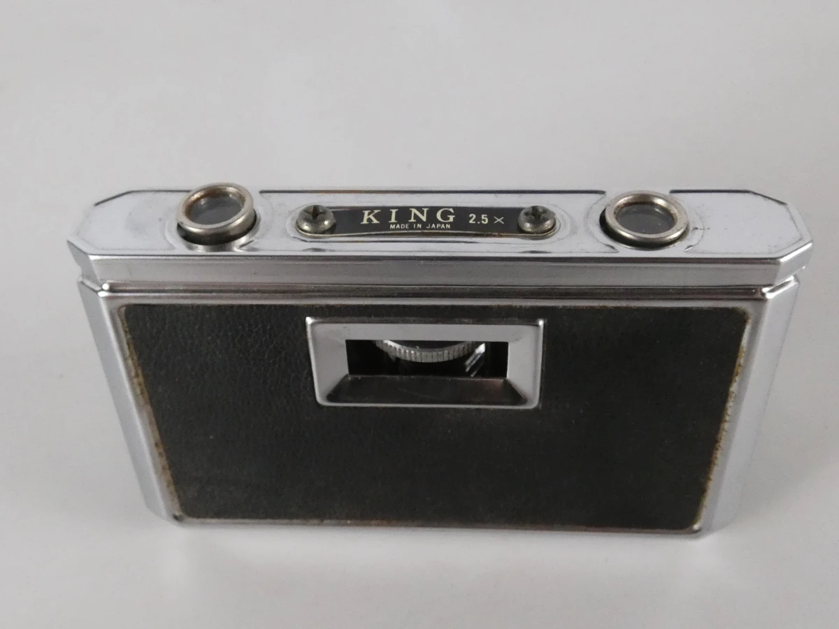 Vintage opera- en verrekijkers met hoesjes