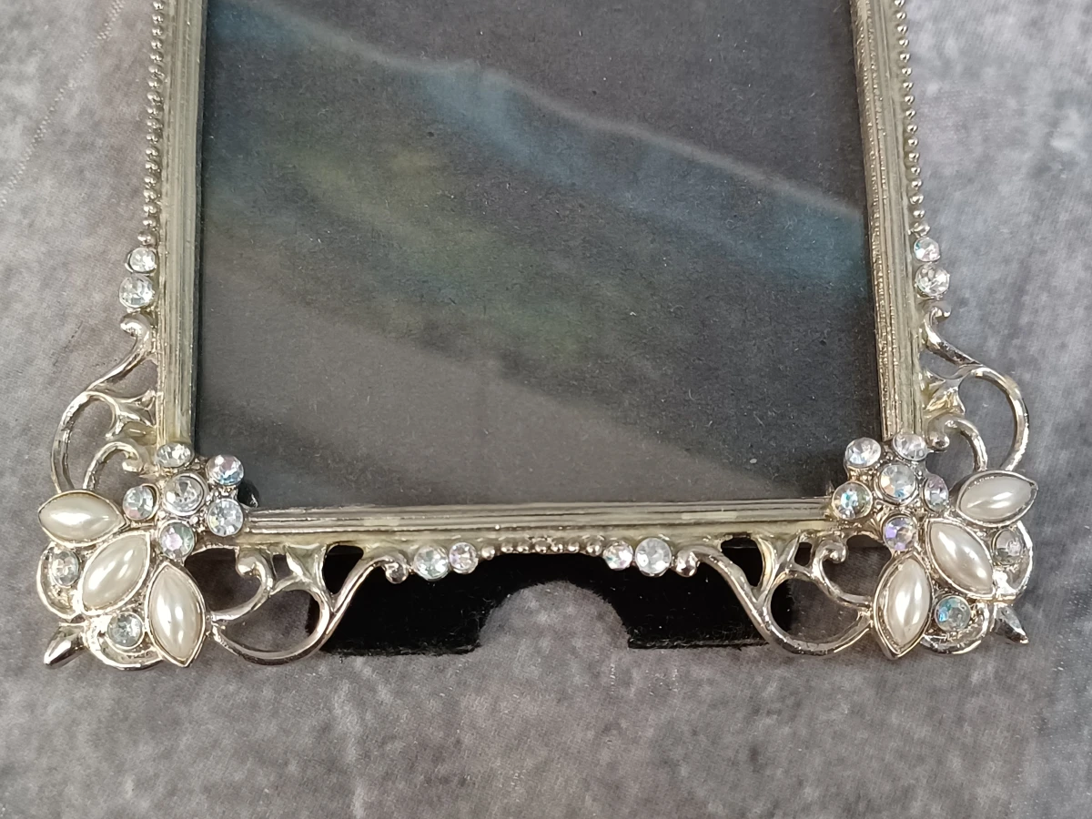Elegante Swarovski fotolijst met bijpassende spiegel en vlinder haarspeld