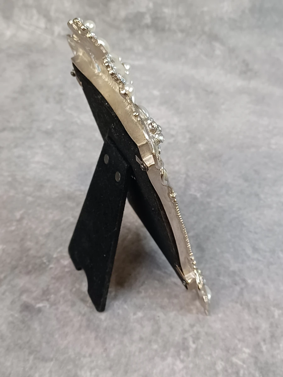 Elegante Swarovski fotolijst met bijpassende spiegel en vlinder haarspeld