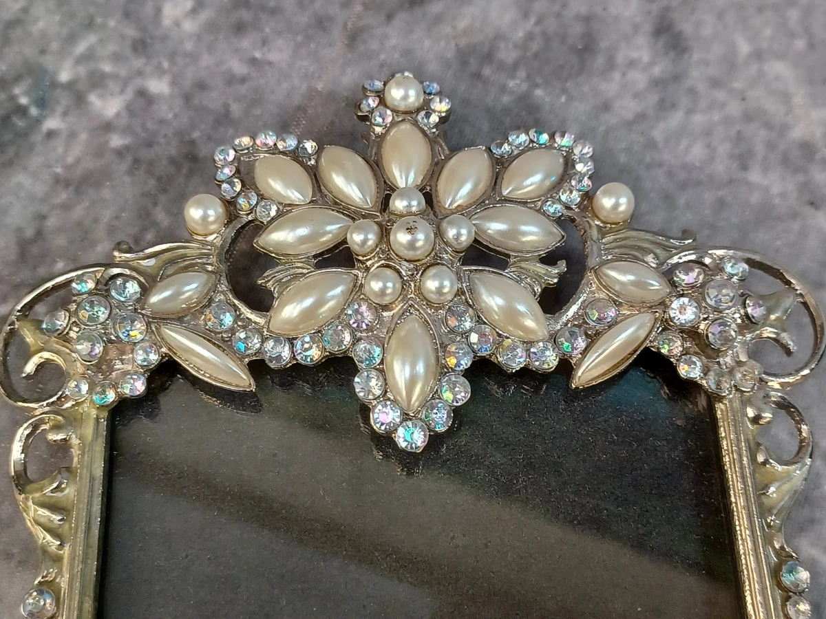 Elegante Swarovski fotolijst met bijpassende spiegel en vlinder haarspeld