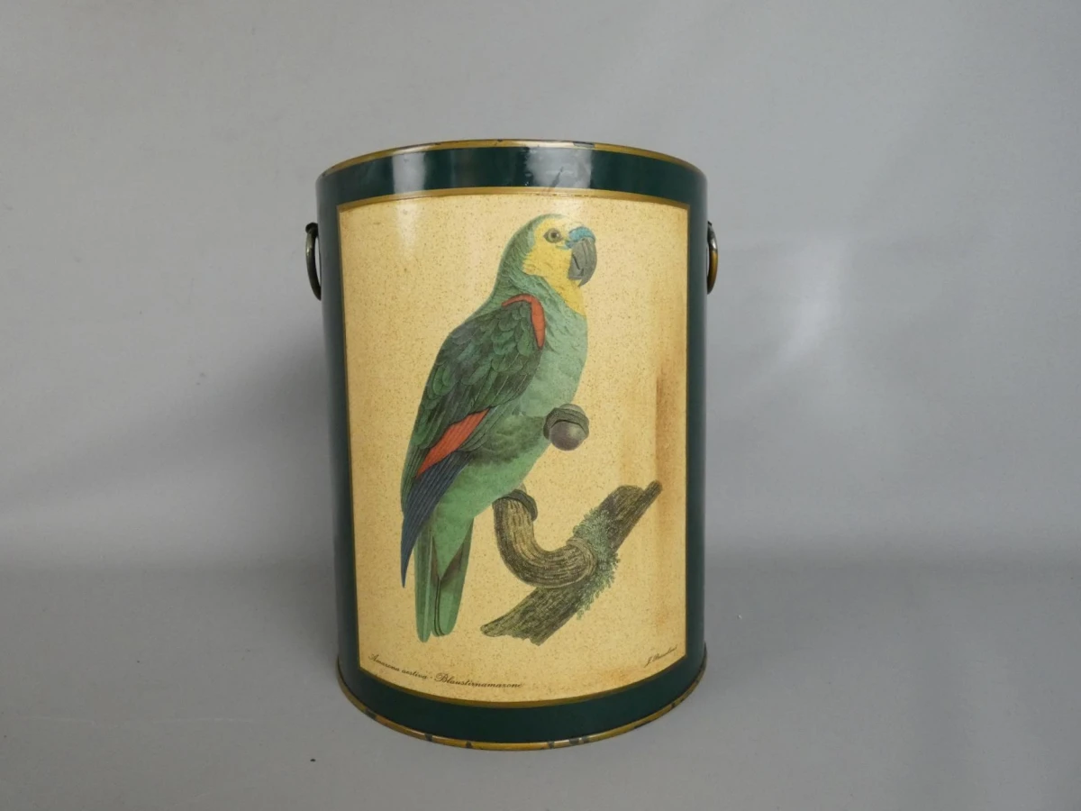 Vintage metalen prullenbak met papegaai-illustratie