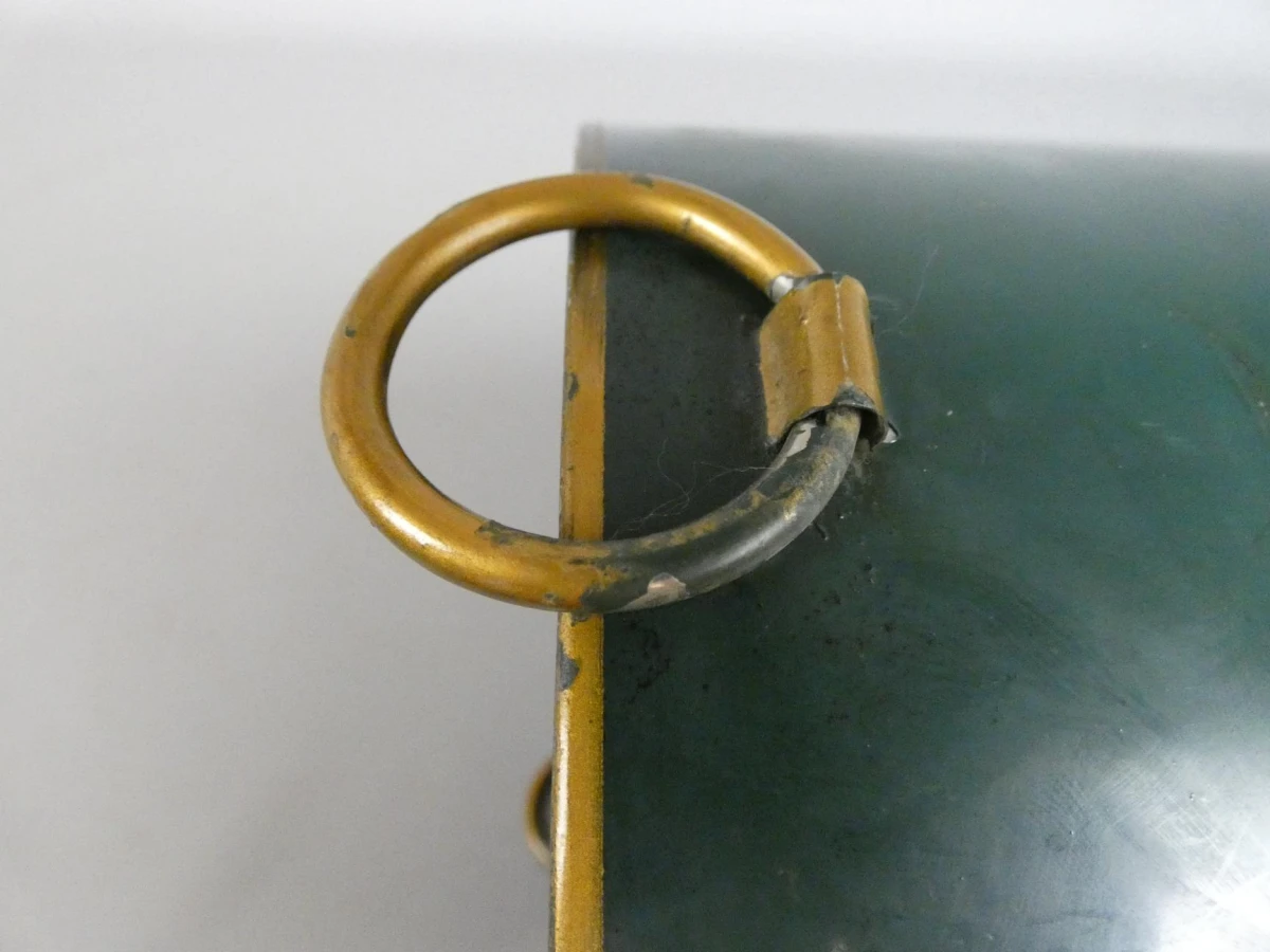 Vintage metalen prullenbak met papegaai-illustratie