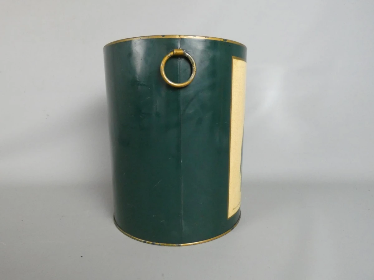 Vintage metalen prullenbak met papegaai-illustratie