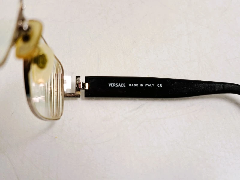 Zwarte bril met metalen montuur en etui Versace