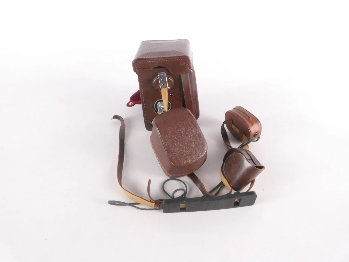 Vintage Rolleiflex camera met accessoires en leren hoes