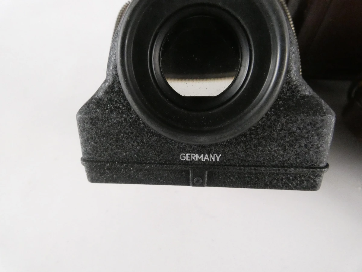 Vintage Rolleiflex camera met accessoires en leren hoes
