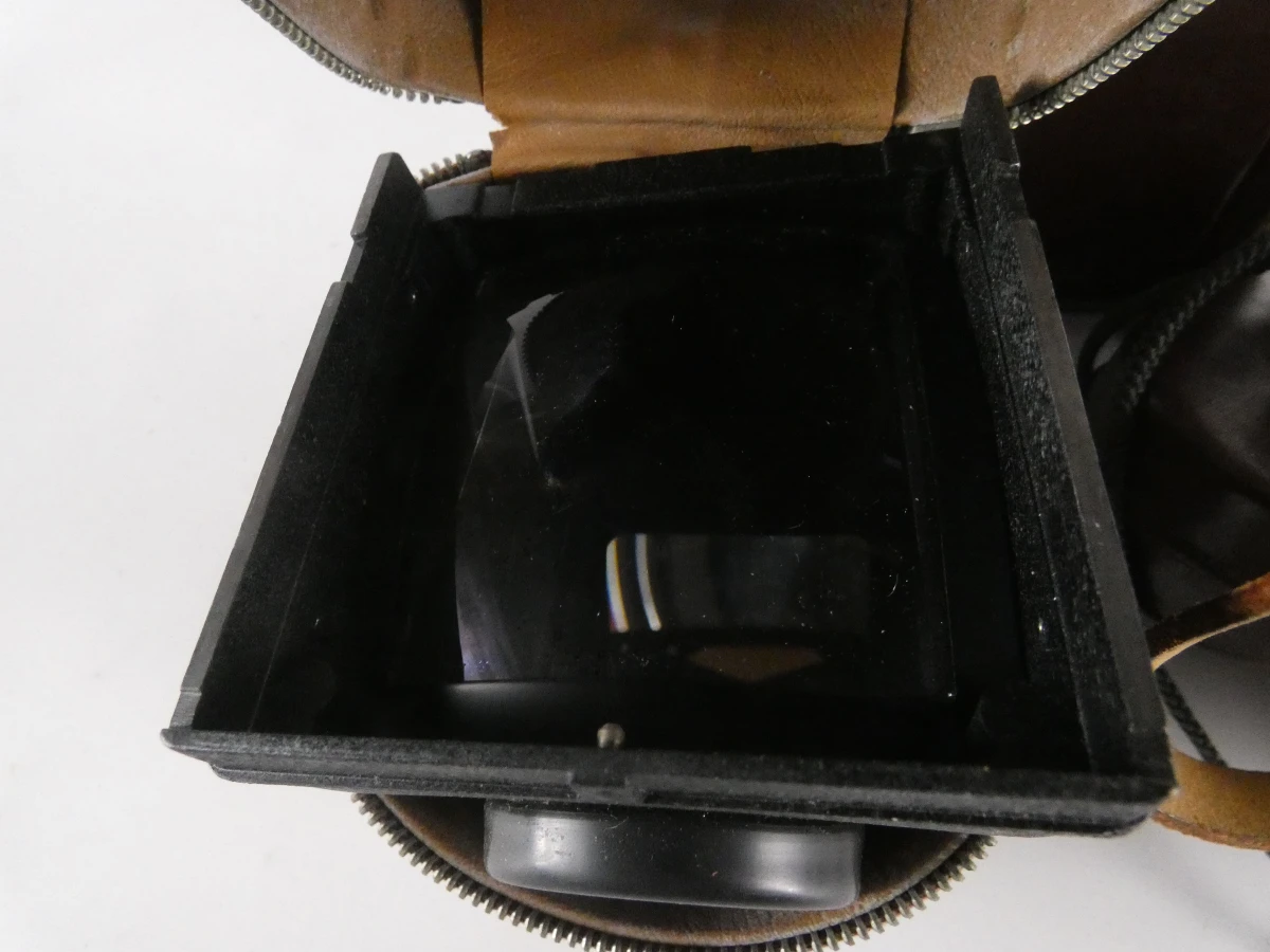 Vintage Rolleiflex camera met accessoires en leren hoes